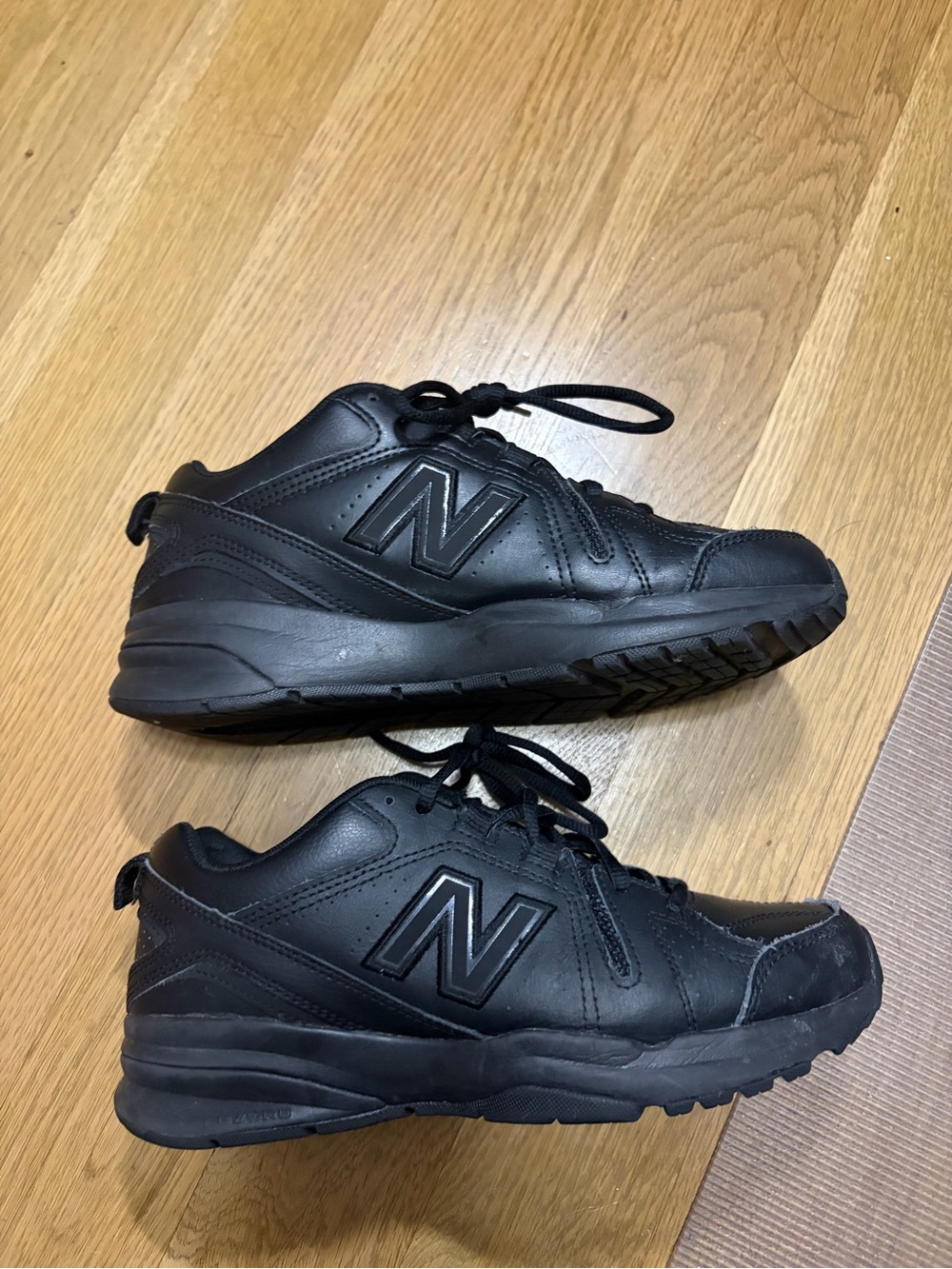 New Balance Women’s Black Leather Lace-Up Sneakers